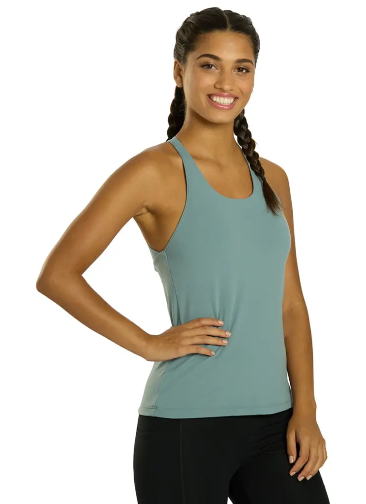 Built-in shelf bra for added support Open cross-back design that keeps tight to the body Eco-friendly and made with Recycled Polyester Manufactured in a Worldwide Responsible Accredited Production (WRAP) factory Details Fabric: 79% Recycled Polyester, 21% Spandex Fit: Fitted Shelf Bra: Yes Support: Medium Front Coverage: Medium Adjustable: No Length: Hip Care: Machine washable Country of Origin: Imported
