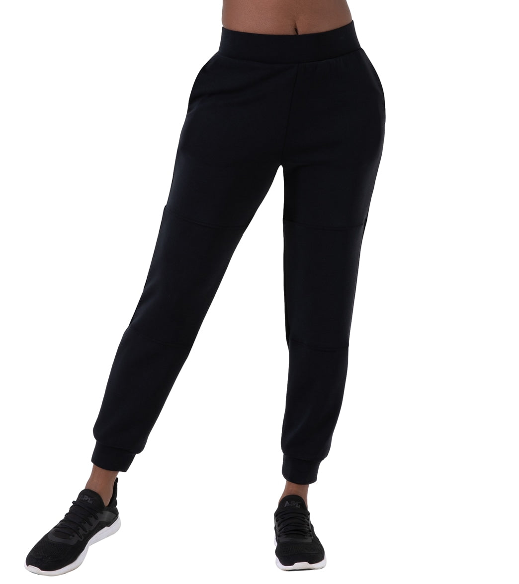 off shoulder bodysuit paired with sleek jogger pants black athleisure