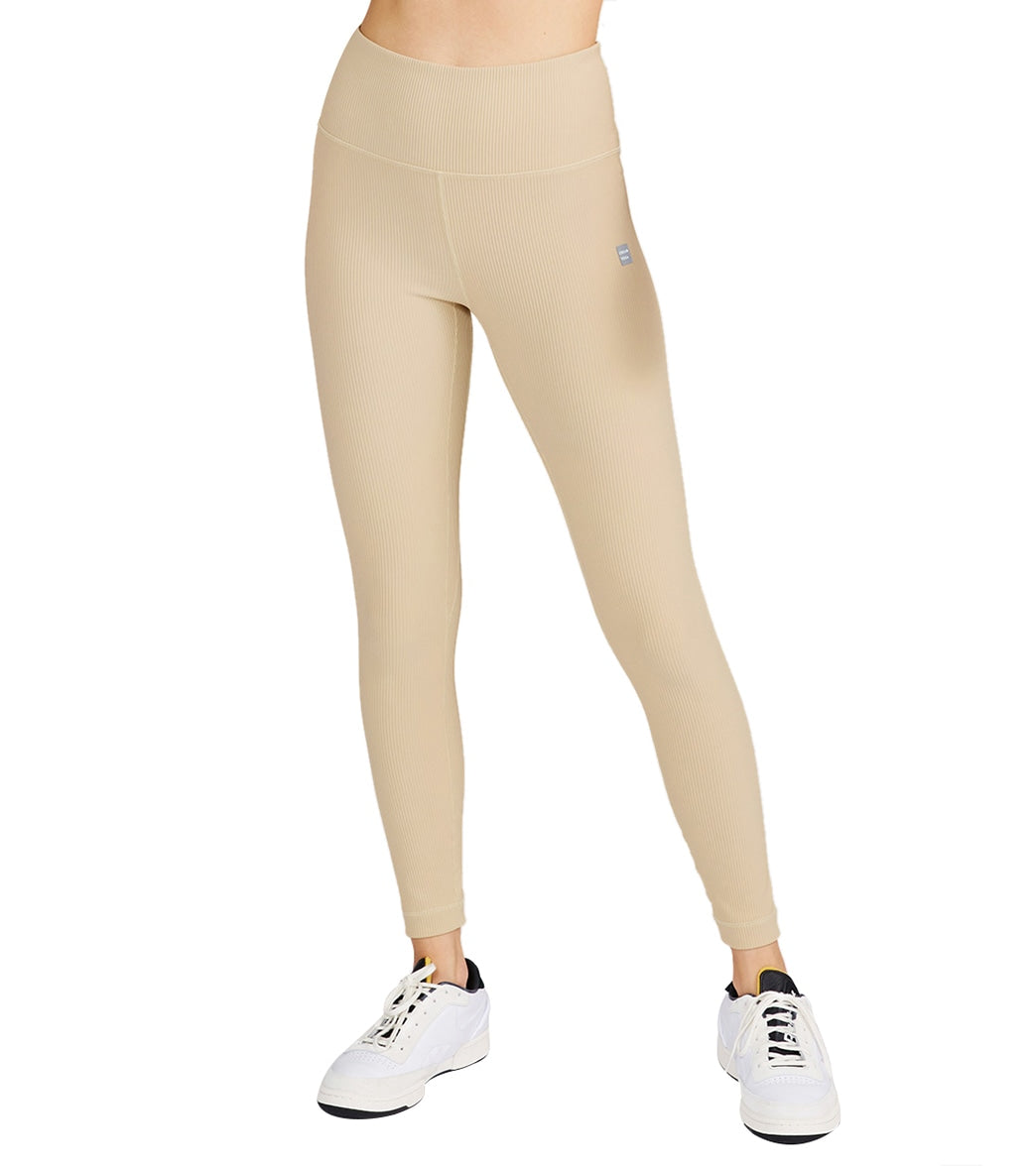 halter one piece yoga outfit styled with ribbed legging