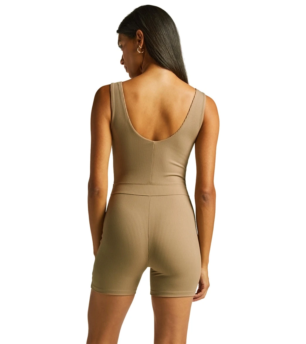 leggings with flared bottoms styled with cropped tee and platform slides for brunch